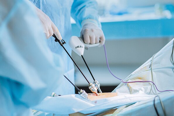 Close,Up,Of,Hands,Of,Surgeons,Team,During,Operation,Uterus